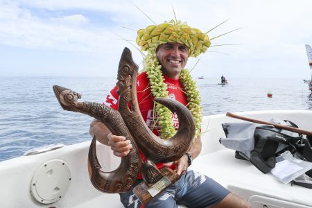 Kelly Slater celebrates winning the Billabong Pro Tahiti for the fifth time in his career and earns the A.I. Award.
